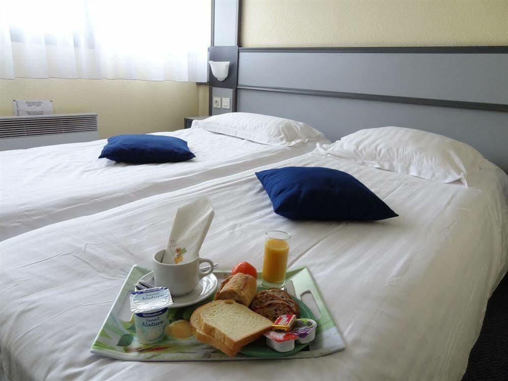 Hotel L'Ortega - Rennes St Jacques Aeroport Сен-Жак-де-ла-Ланд Экстерьер фото