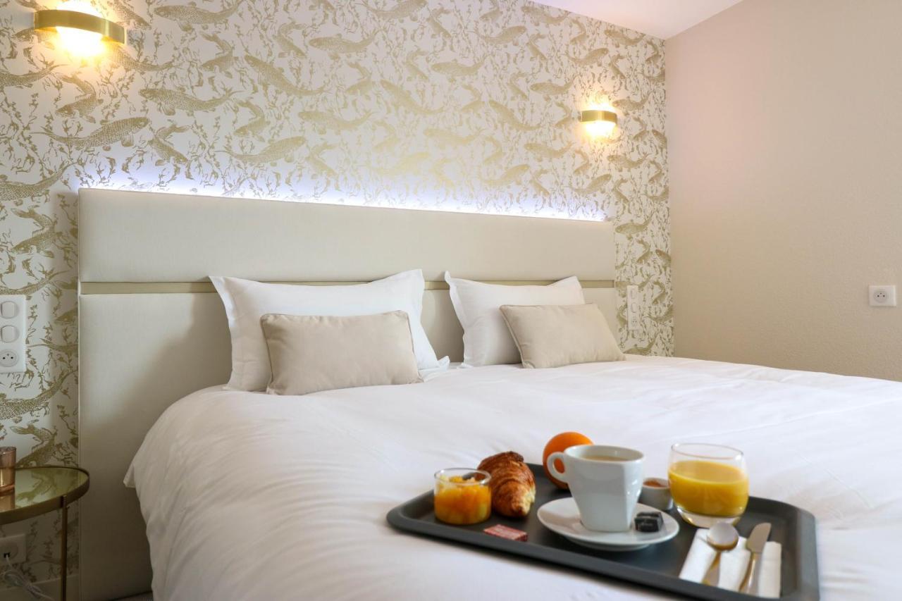Hotel L'Ortega - Rennes St Jacques Aeroport Сен-Жак-де-ла-Ланд Экстерьер фото